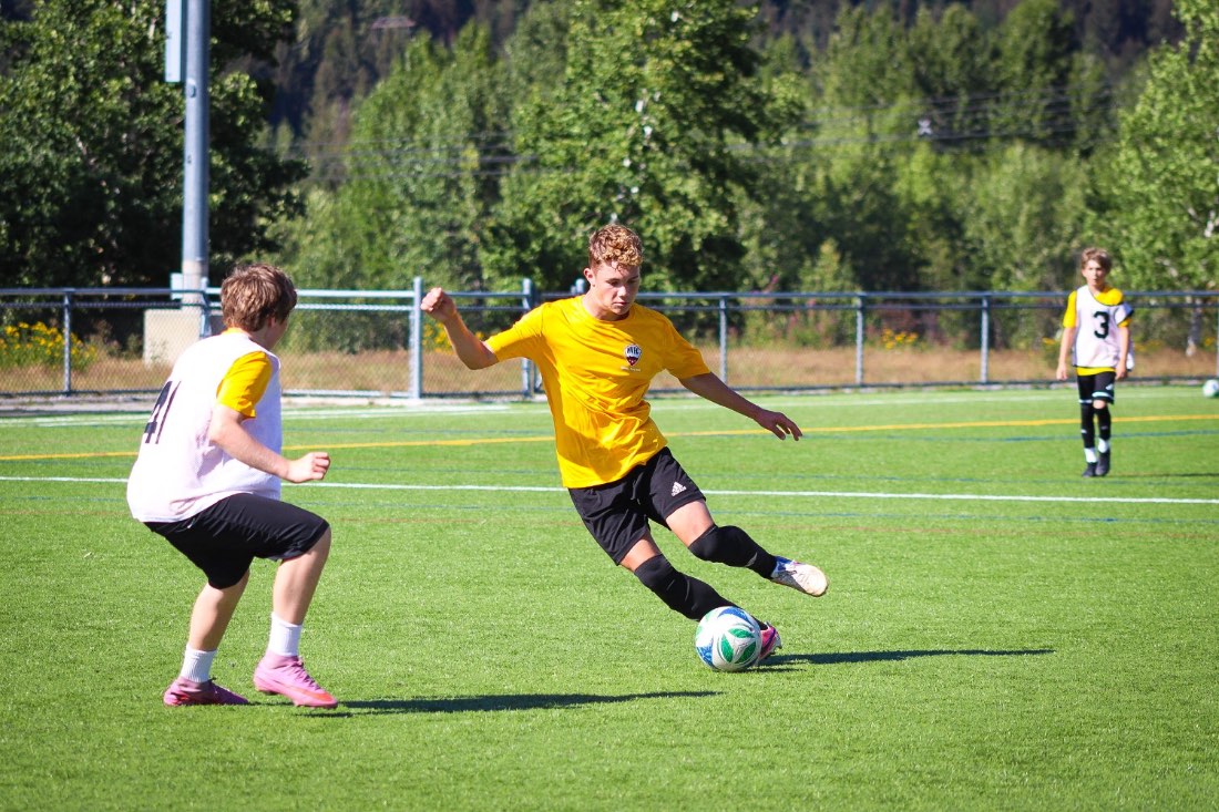A player striking the ball in a game